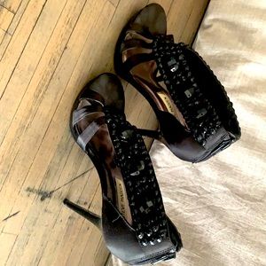 Steve Madden black stiletto sandals.